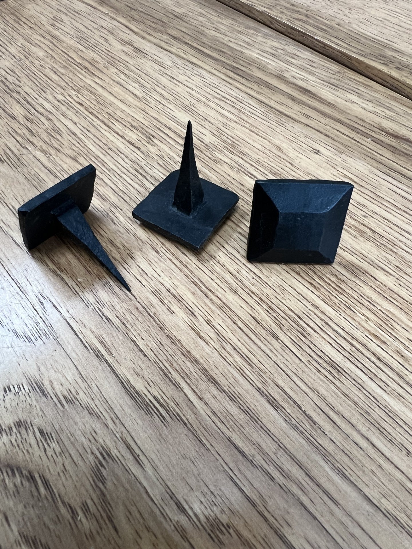 Hand Forged Iron Square Clavos With Raised Surface 1" and 1 1/4" oil blackened
