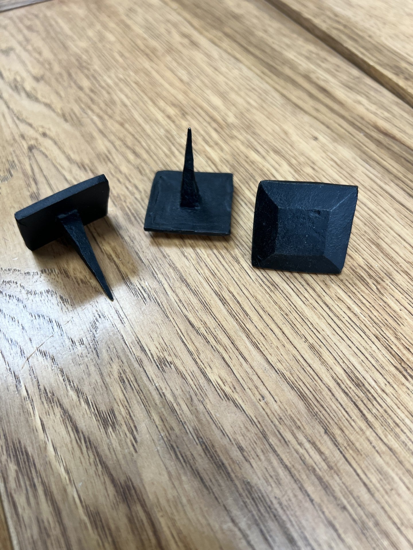 Hand Forged Iron Square Clavos With Raised Surface 1" and 1 1/4" oil blackened