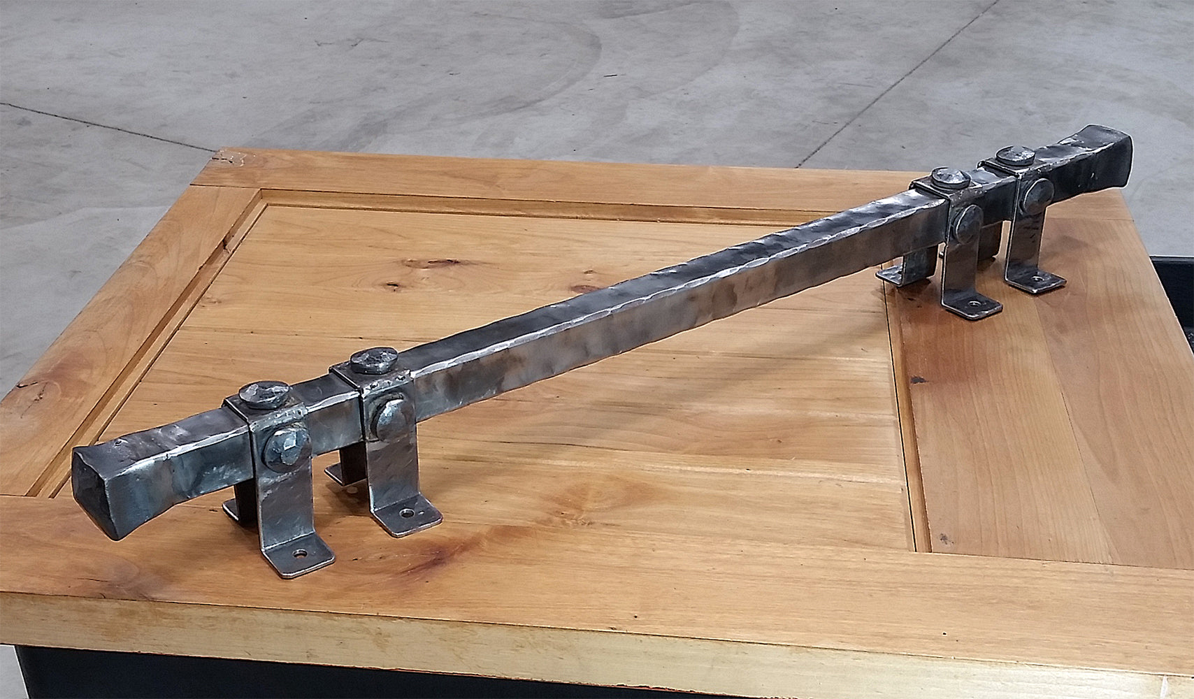 A Hand Grabbing on to an Extra Large Door Pull Barn Door Handle
