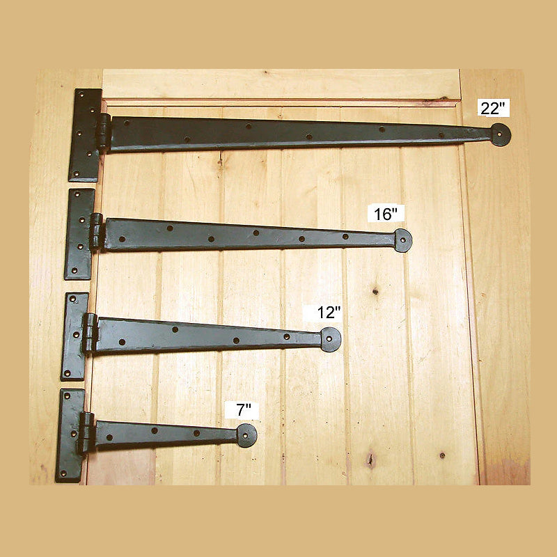 A photo of 4 colonial hinges that measure 7, 12, 16, and 22 inches. Hinges feature a matte black finish.