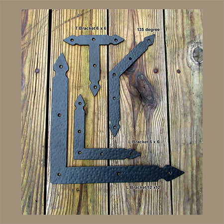 A photo of two L brackets, one T bracket, and one 135-degree bracket.