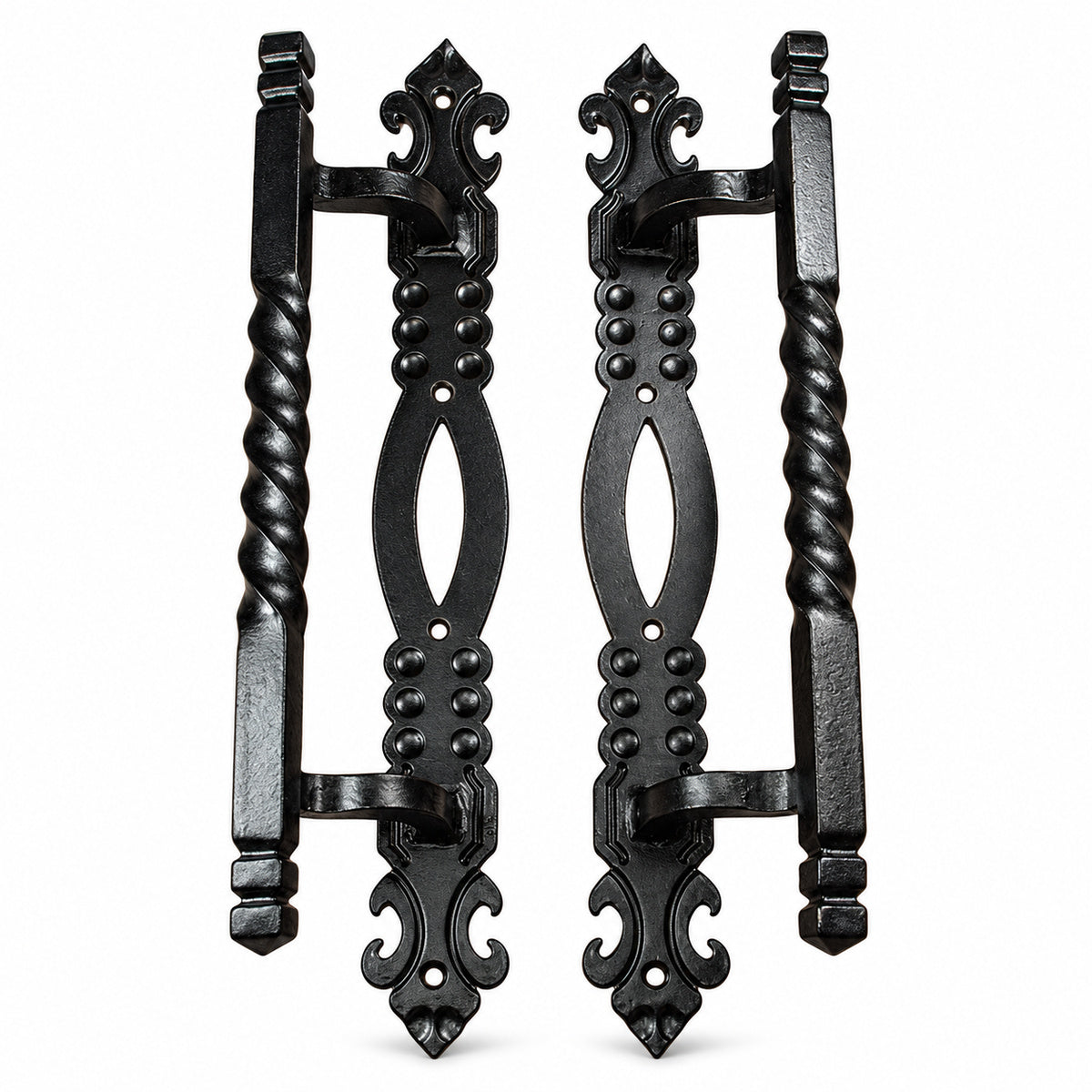 A pair of Large Twisted Iron Door Pulls with Fancy Back Plate on a white background