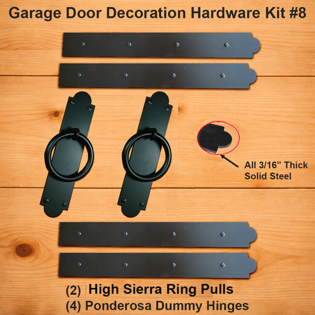 Garage door decoration hardware kit #8 with high Sierra ring pulls and Ponderosa dummy hinges on a wooden surface.