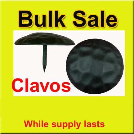 Clavos sold in bulk, decorative nail heads with a rustic appearance, displayed on a white background.
