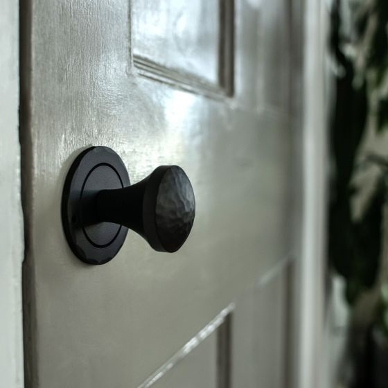 Iron Art Hammered Double Knob Passage Set - 2-3/8" Inch Backset - Round Rose - Matte Black Finish - Sold as Set