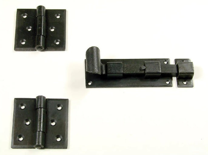 Components of a black Speakeasy door mounting kit.