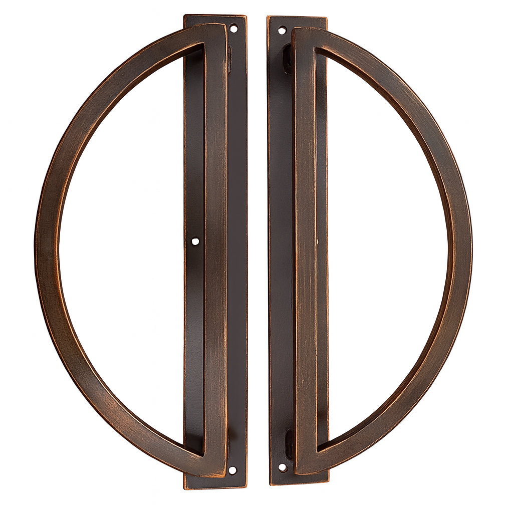 Pair of oil rubbed bronze door handles on a white background