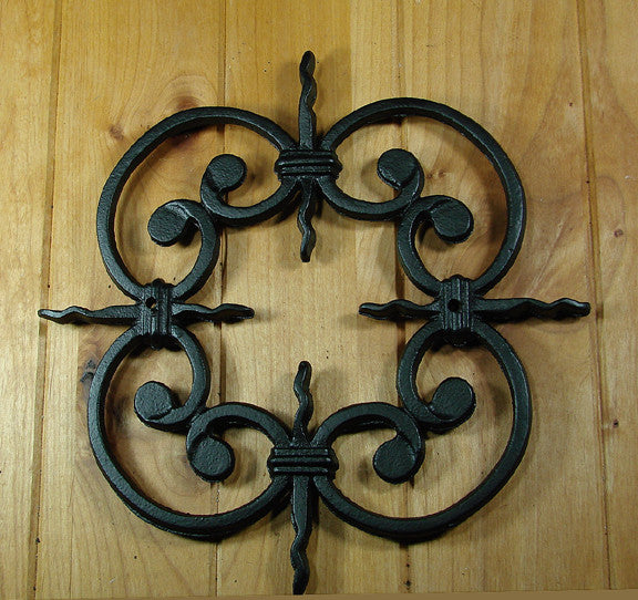 A decorative metal grill with a geometric pattern, displayed on a white background.