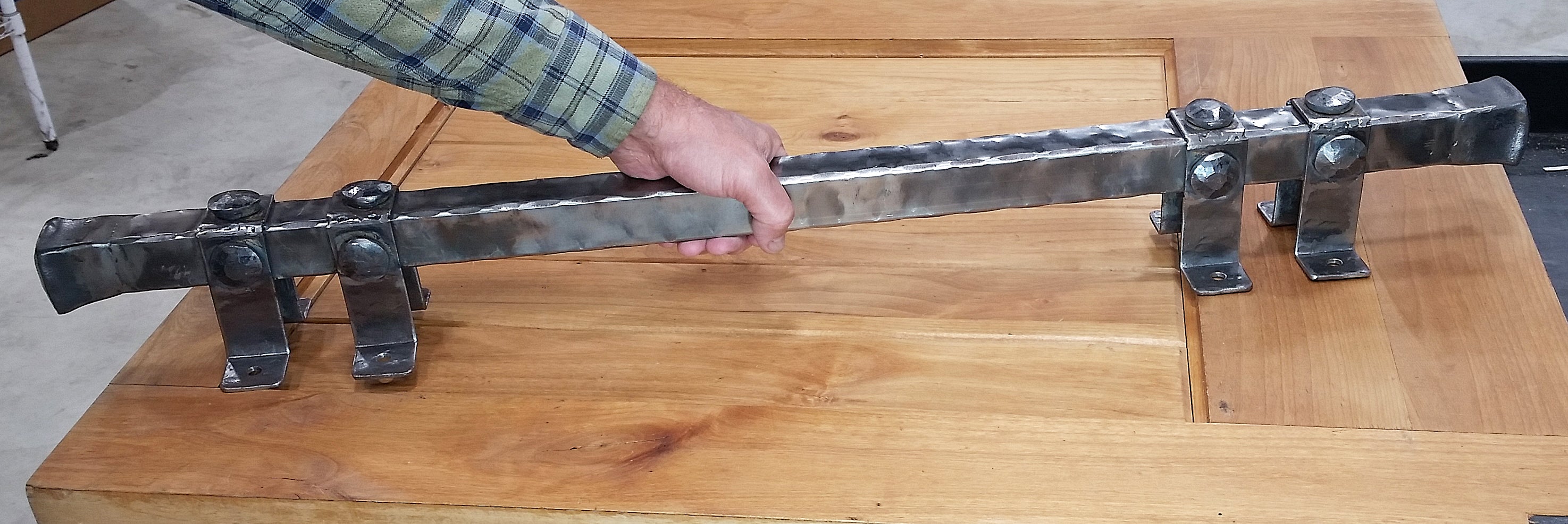 A Hand Grabbing on to an Extra Large Door Pull Barn Door Handle