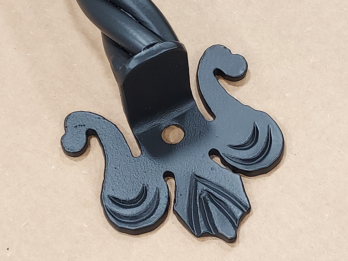 Twisted strand iron barn door handle with Fleur De Lis mounting plates - closeup - Wild West Hardware